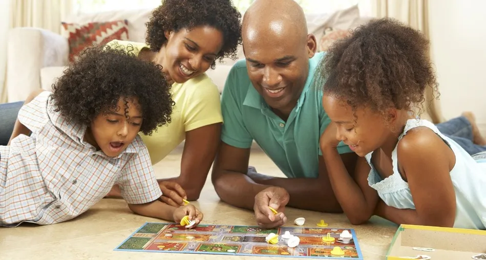 Family playing board games