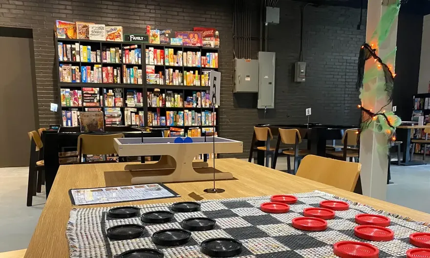 People playing board games cafe